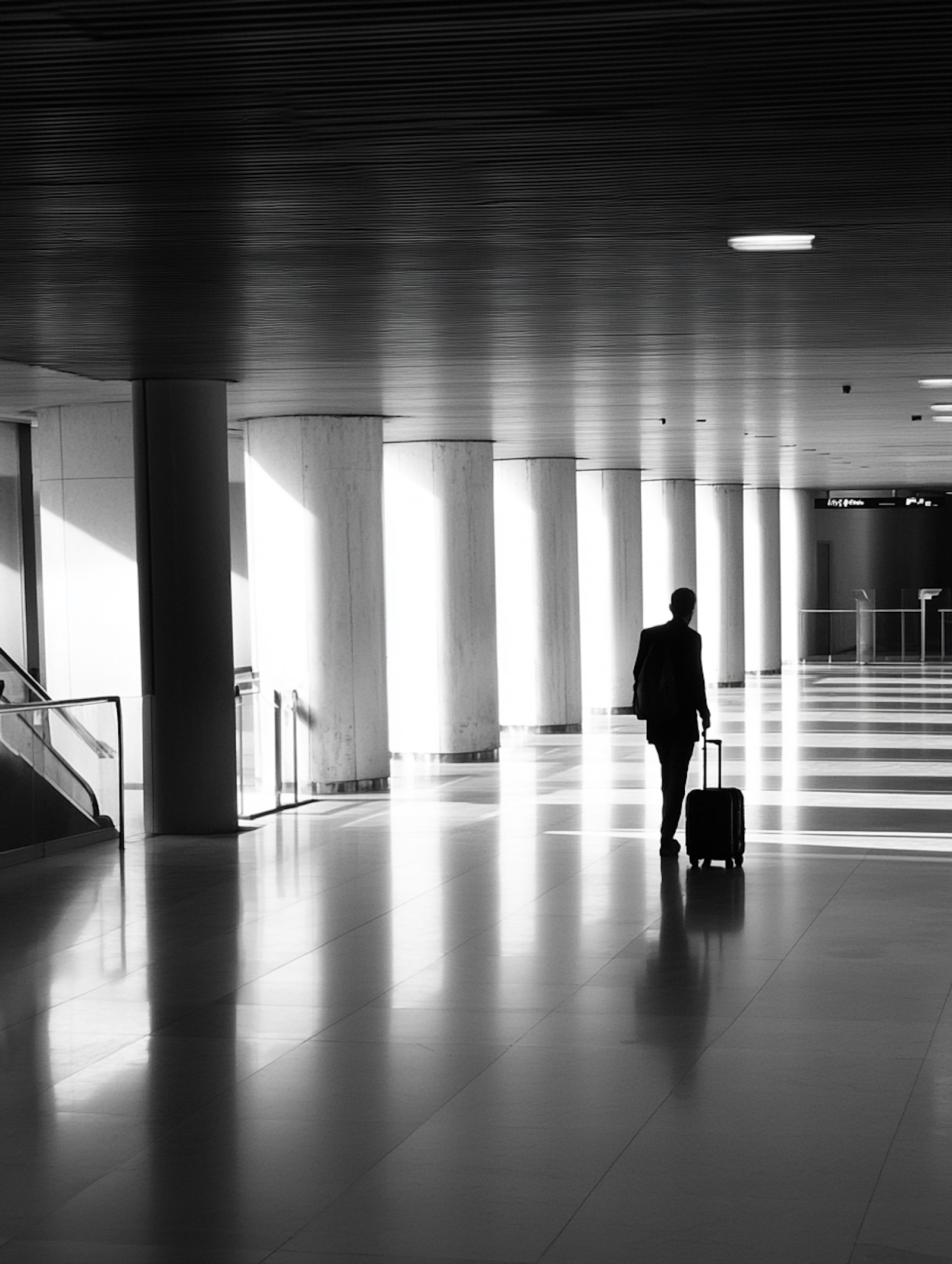 Traveler walking through a terminal